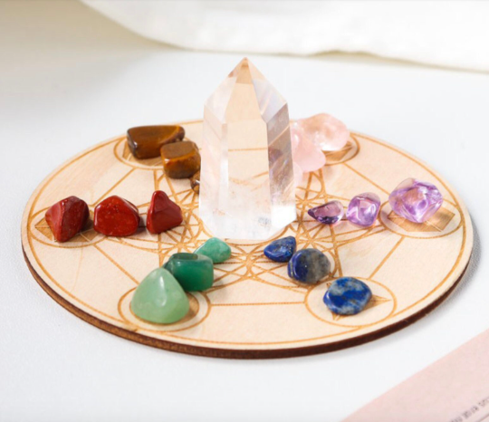 White Crystal Towers with Rainbow Gemstones on a Wooden Crystal Grid Board - Seven Star Formation